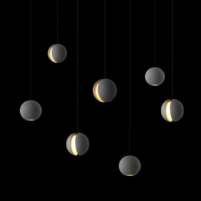 Modern pendellampa i månform