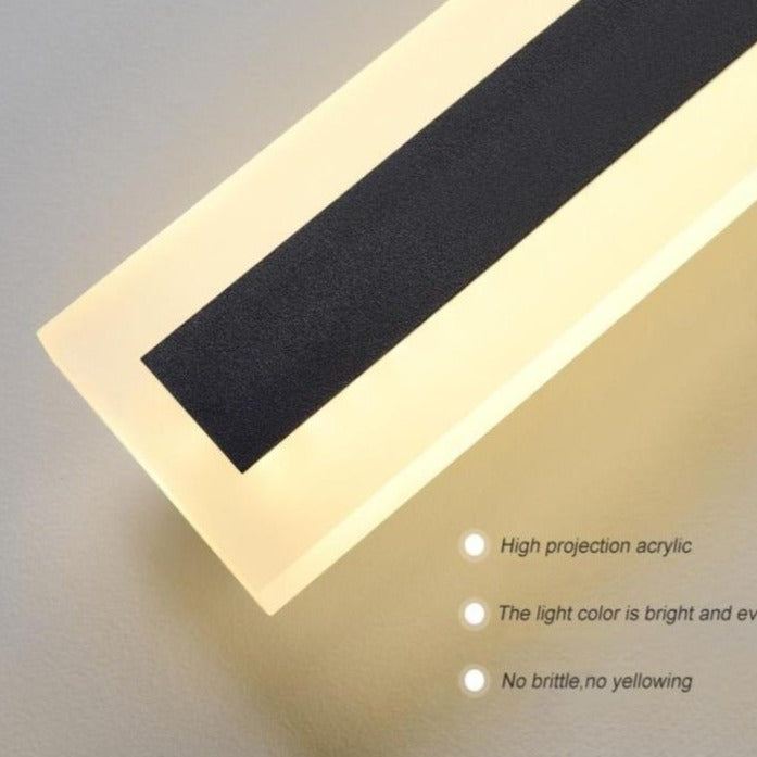 Vattentät utomhusvägglampa med en ram