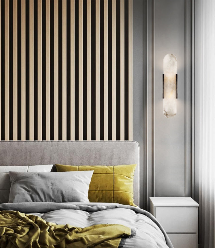 Oval vägglampa i marmor