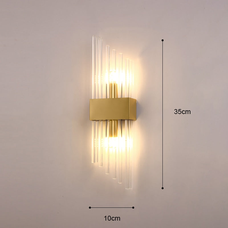 Vägglampa i guldkristall