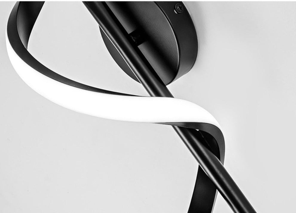 Modern spiralformad led-vägglampa