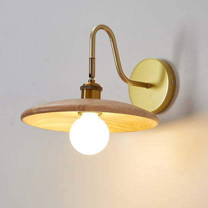Justerbar vägglampa för sängbord