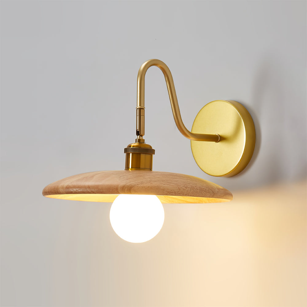 Justerbar vägglampa för sängbord