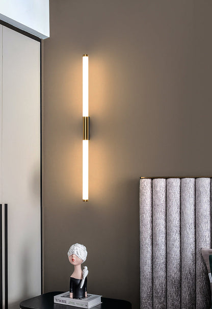 Vägglampa i guld för sovrum