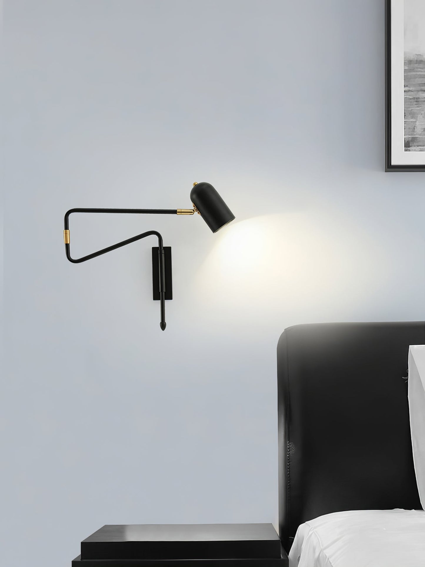 Vägglampa med roterande arm
