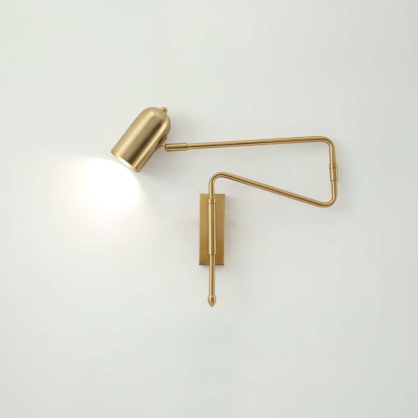Vägglampa med roterande arm