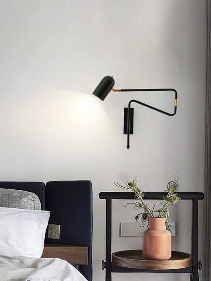 Vägglampa med roterande arm