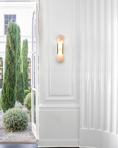 Oval vägglampa i marmor