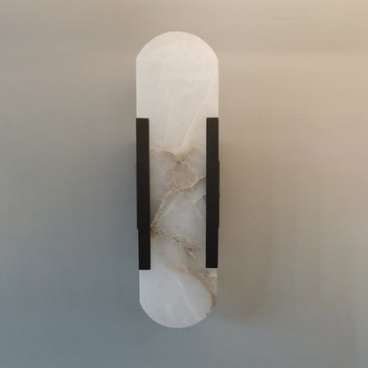 Oval vägglampa i marmor