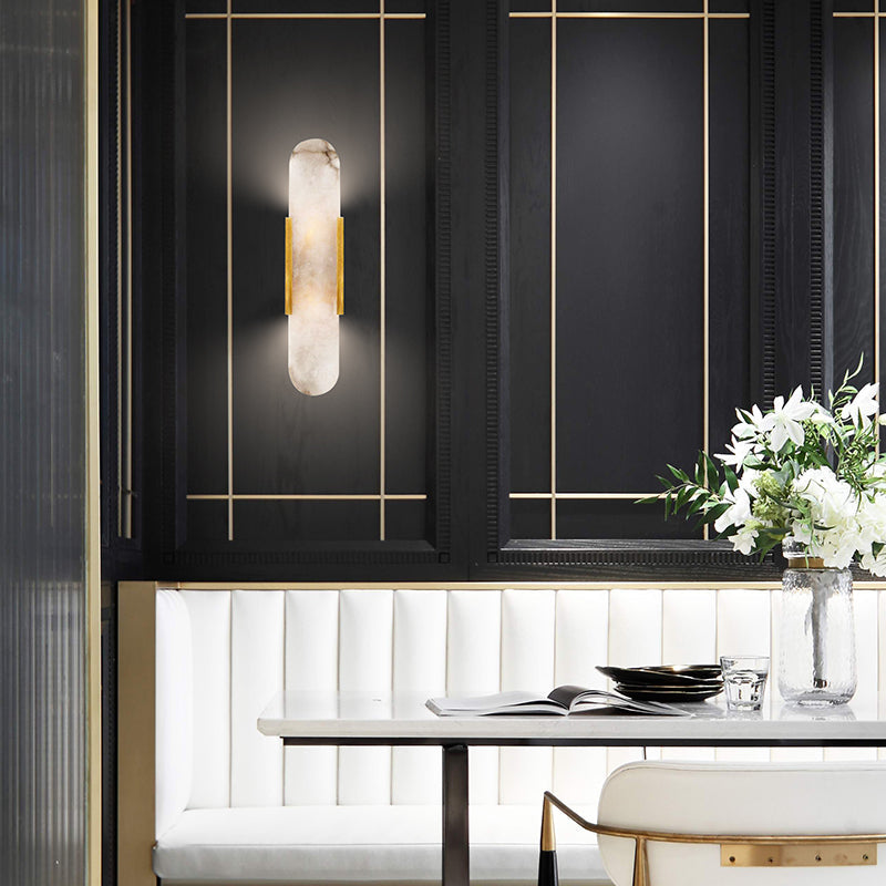 Oval vägglampa i marmor