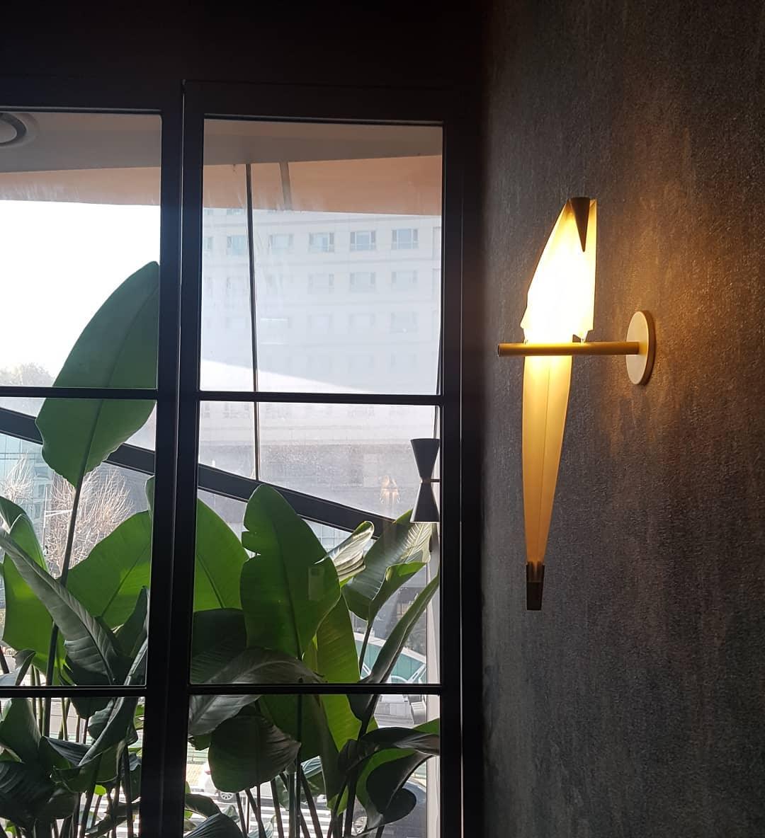 Vägglampa med fågelform