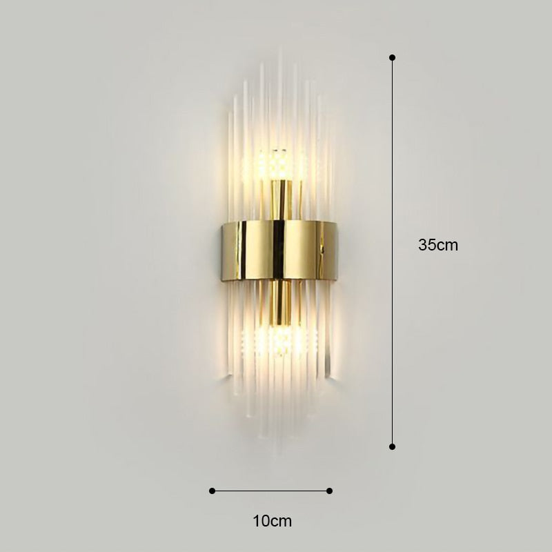 Vägglampa i guldkristall