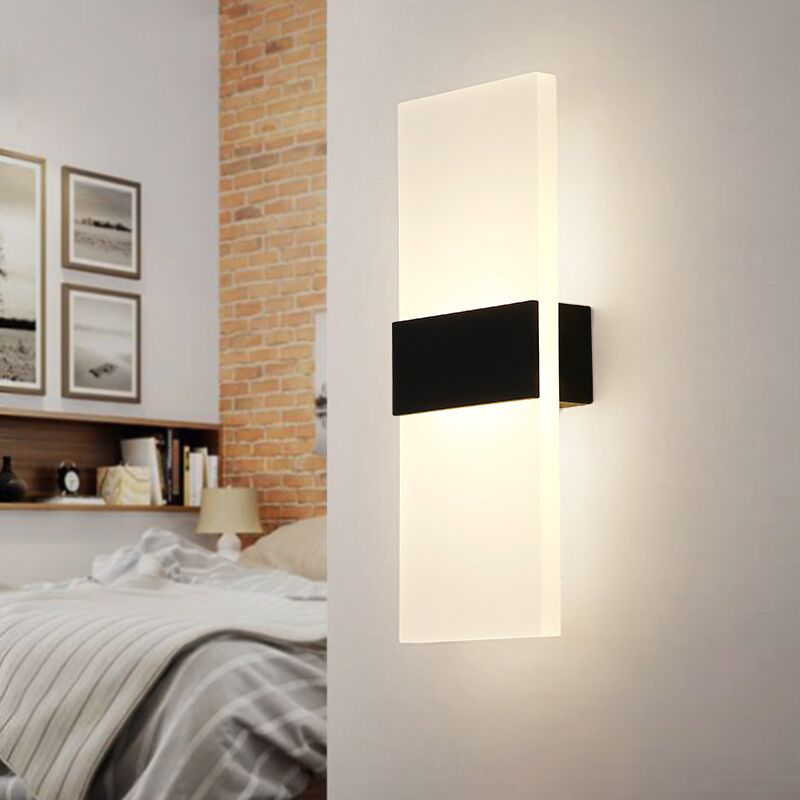 Vägglampa för modernt sovrum