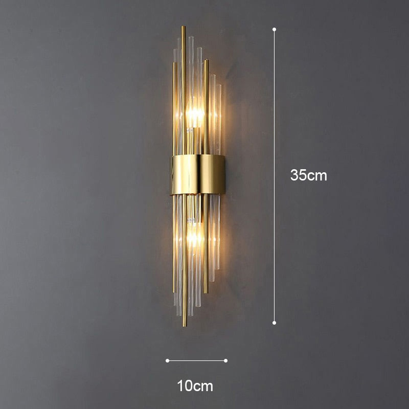 Vägglampa i guldkristall